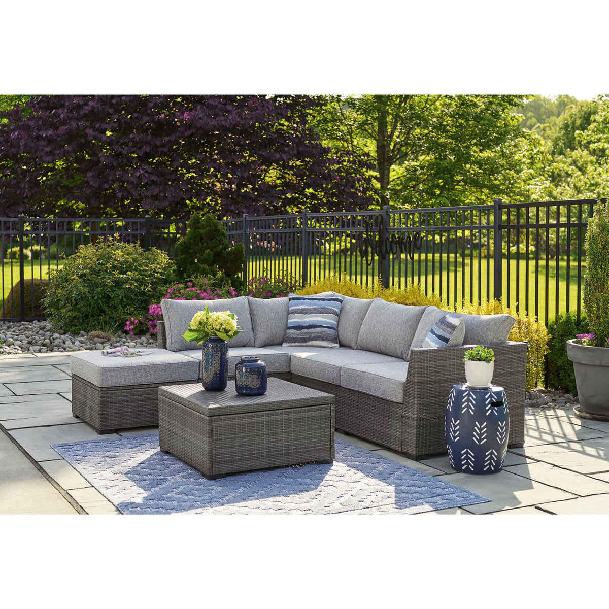 Petal Road Outdoor Sectional with Ottoman and Coffee Table