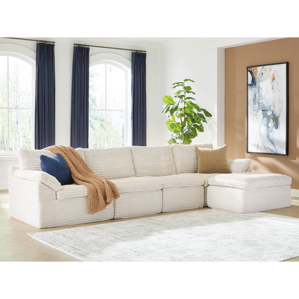 Canefield 4 Piece Sectional with Ottoman | Ashley Canada